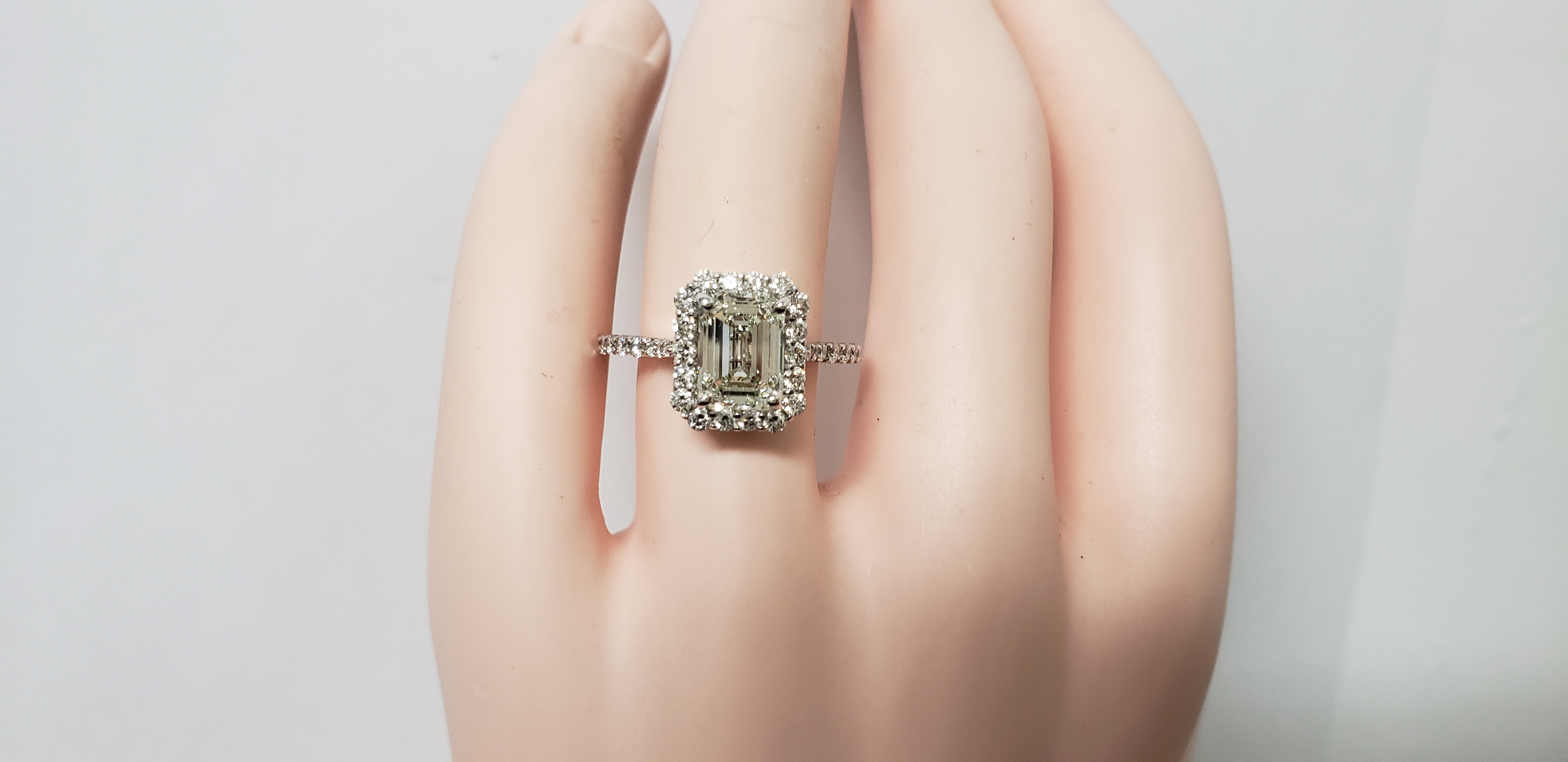 Emerald & Round Diamond Halo Ring
